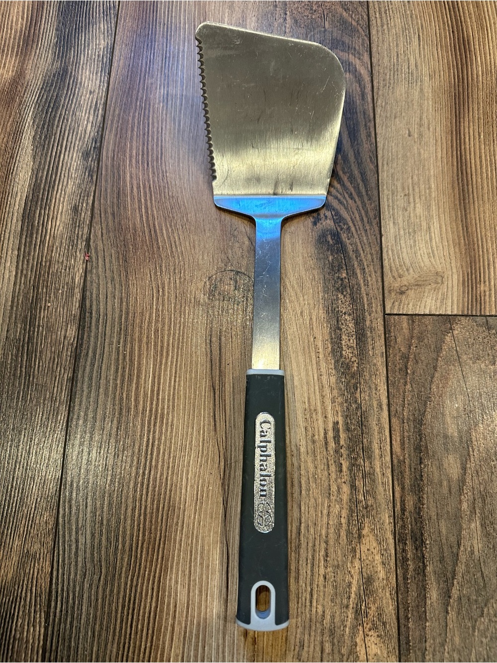 Calphalon Stainless Serrated Turner with Black Handle Kitchen Utensil